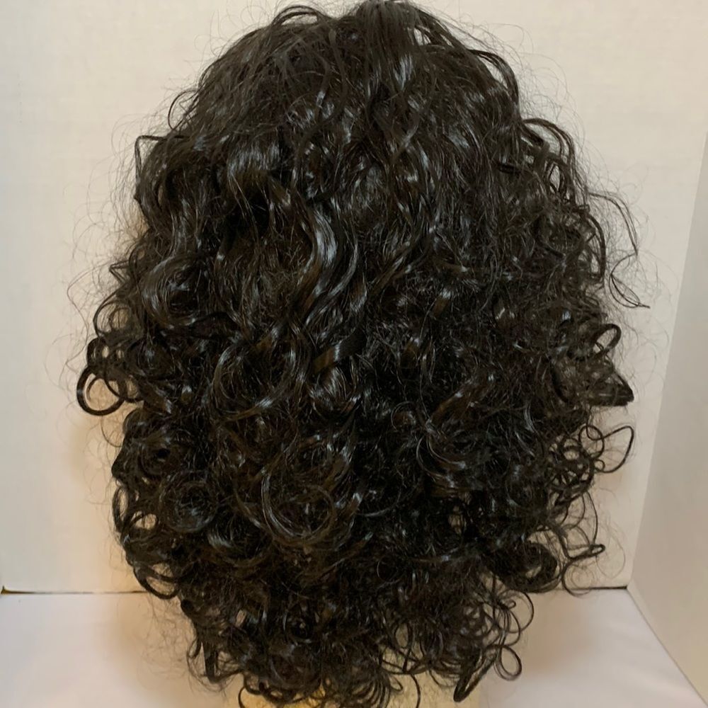 Beautiful black wig with curls.  Dense hair & full wig cap